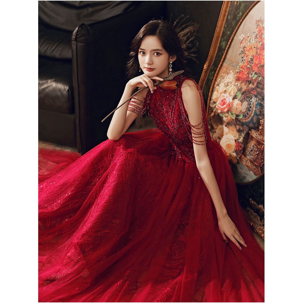Wine red wedding dress for brides exuding elegance and sophistication featuring delicate tassels on the shoulders a touch of understated luxury image 4