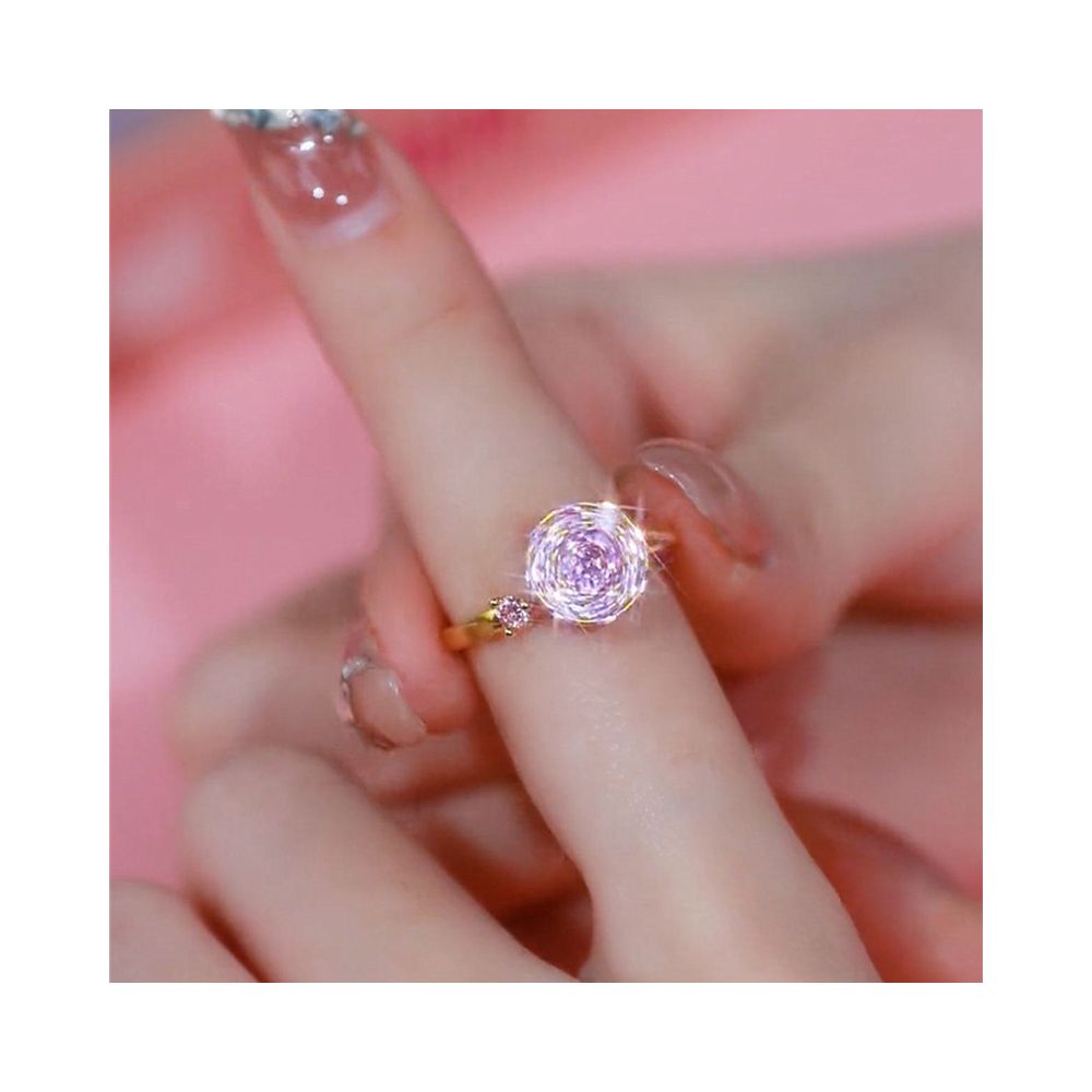 High end trending on TikTok this elegant luxurious and fashionable rotating pink ring is super sparkly with full diamonds and an open design perfect for women image 1