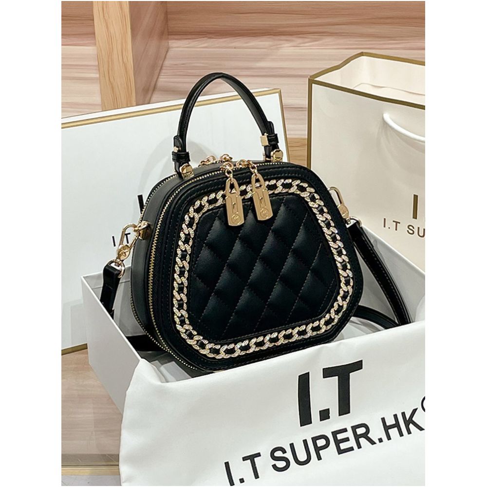 Hong Kong counter genuine leather bag women s 2025 new fashionable simple hand held small round bag high end single shoulder crossbody bag image 1