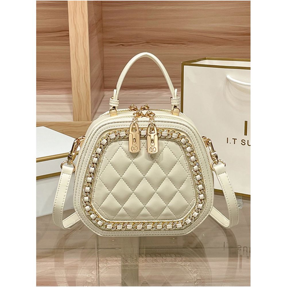 Hong Kong counter genuine leather bag women s 2025 new fashionable simple hand held small round bag high end single shoulder crossbody bag image 3