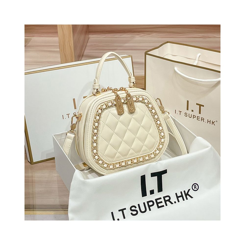 Hong Kong counter genuine leather bag women s 2025 new fashionable simple hand held small round bag high end single shoulder crossbody bag