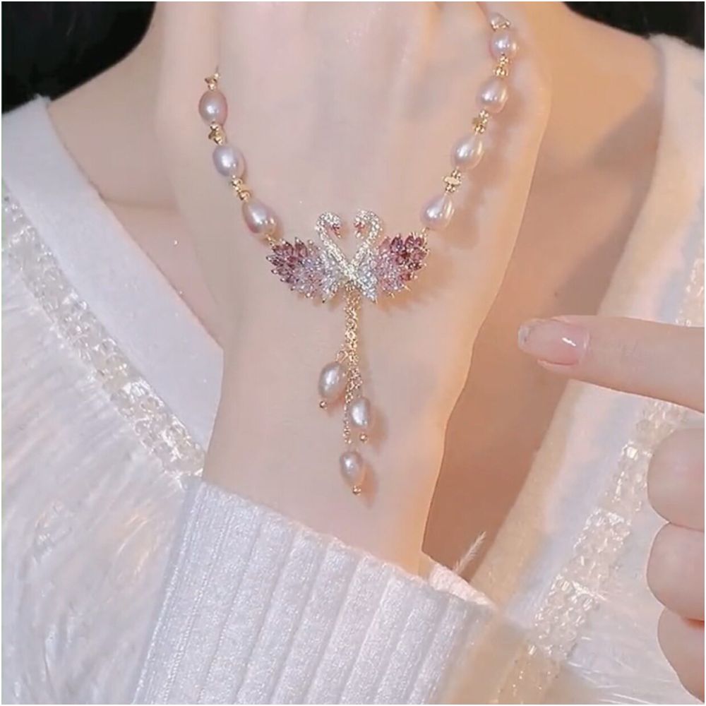 Japanese and Korean style 2026 new swan pink pearl necklace women s high end design fashionable cheongsam sweater chain