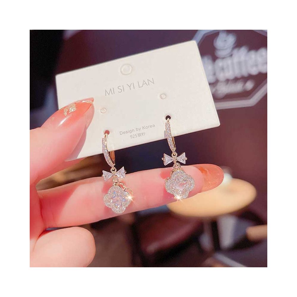 Korean style fashion temperament exaggerated personality four leaf clover zircon earrings for women 2026 new light luxury high end earrings