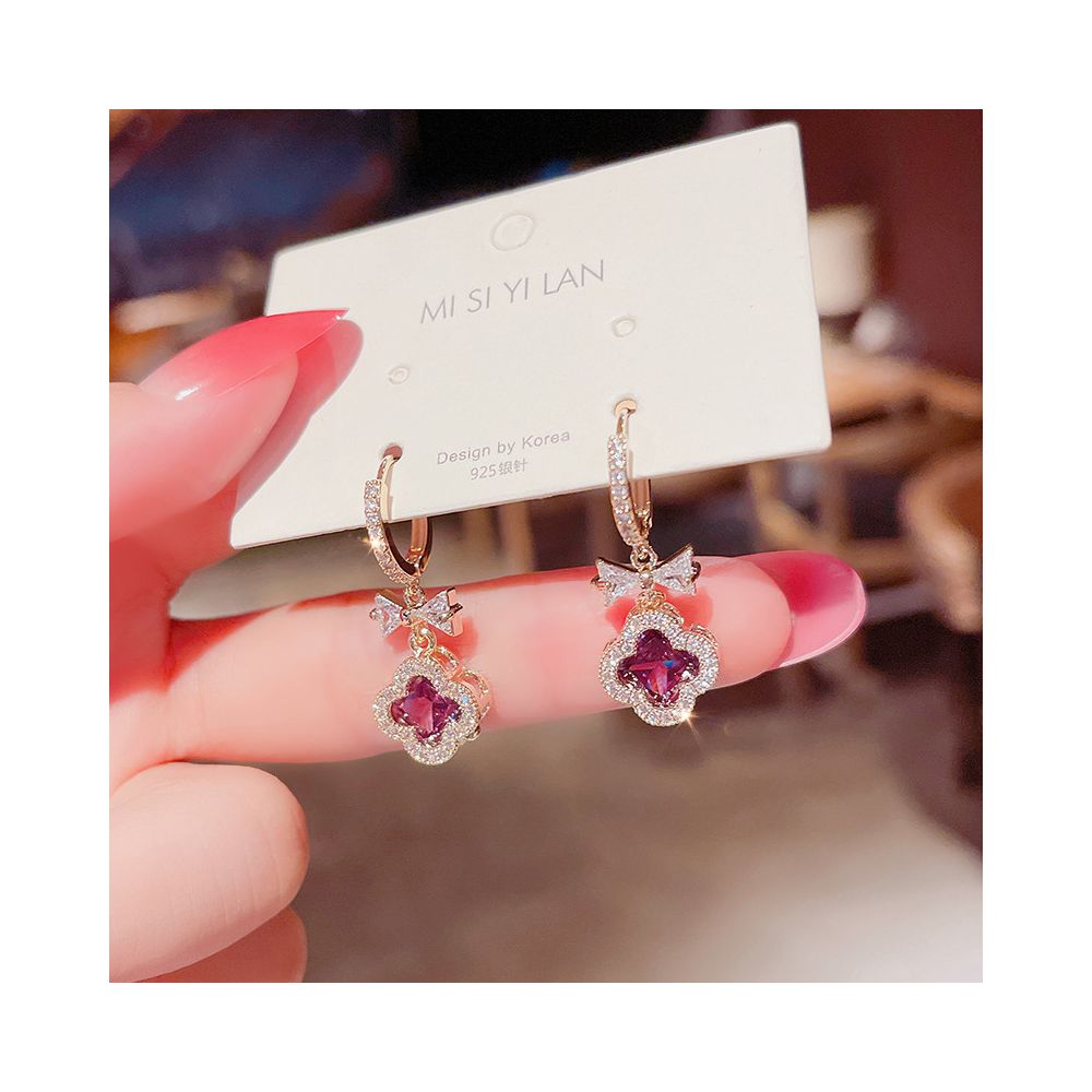 Korean style fashion temperament exaggerated personality four leaf clover zircon earrings for women 2026 new light luxury high end earrings