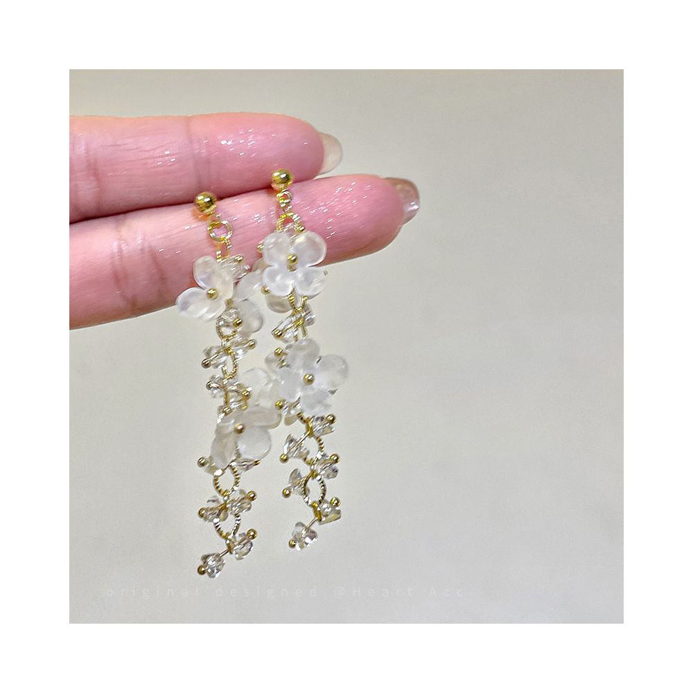Exquisite flower tassel earrings for women 2025 new seaside vacation style earrings suitable for high end earrings with square and round faces