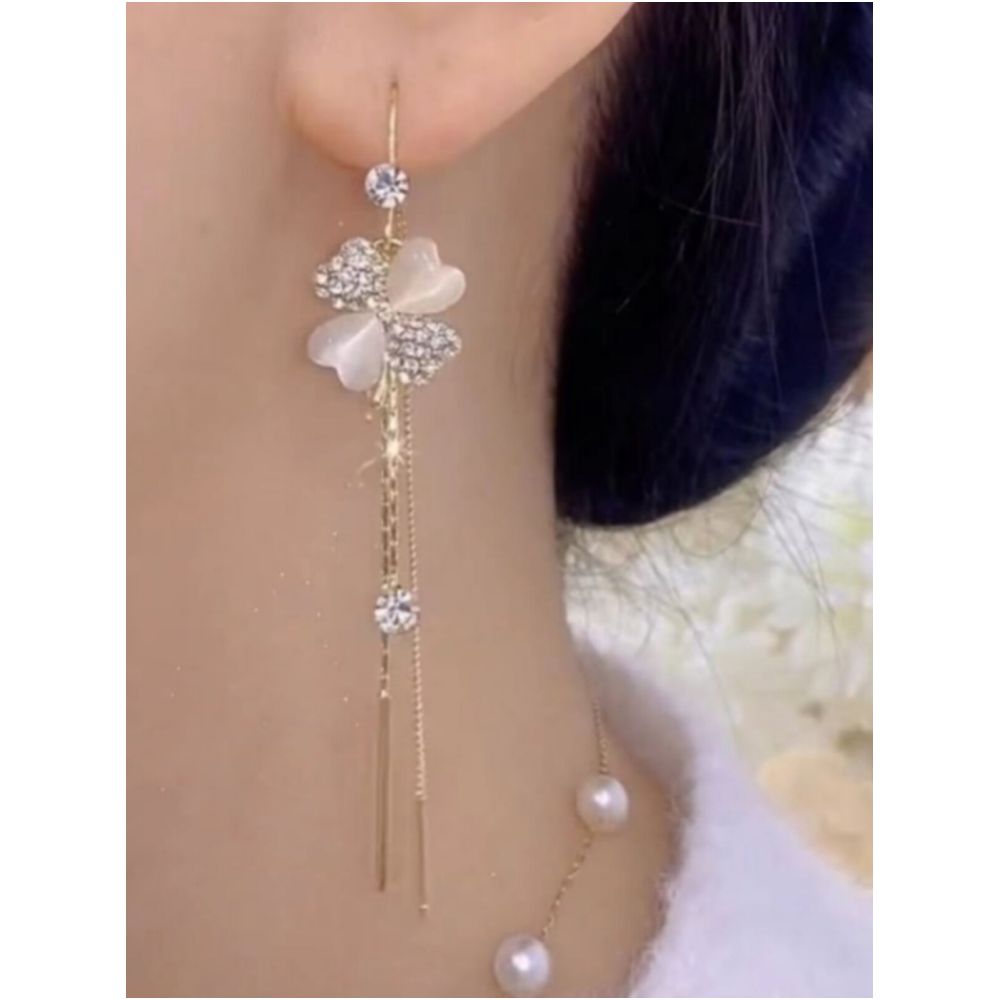 Light luxury temperament cat eye stone four leaf flower long tassel earrings round face slimming ear line 2026 new explosive earrings image 2
