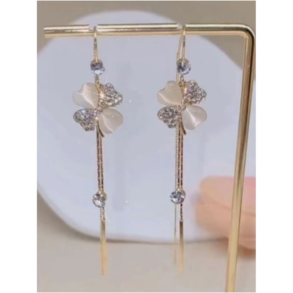 Light luxury temperament cat eye stone four leaf flower long tassel earrings round face slimming ear line 2026 new explosive earrings image 3