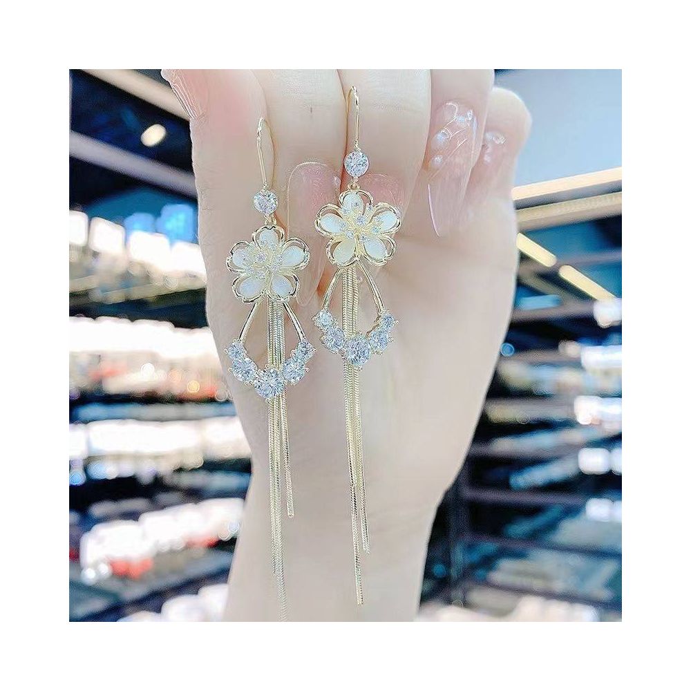 Korean temperament earrings women s flower tassel earrings women s internet famous new high end style long style face slimming earrings earrings