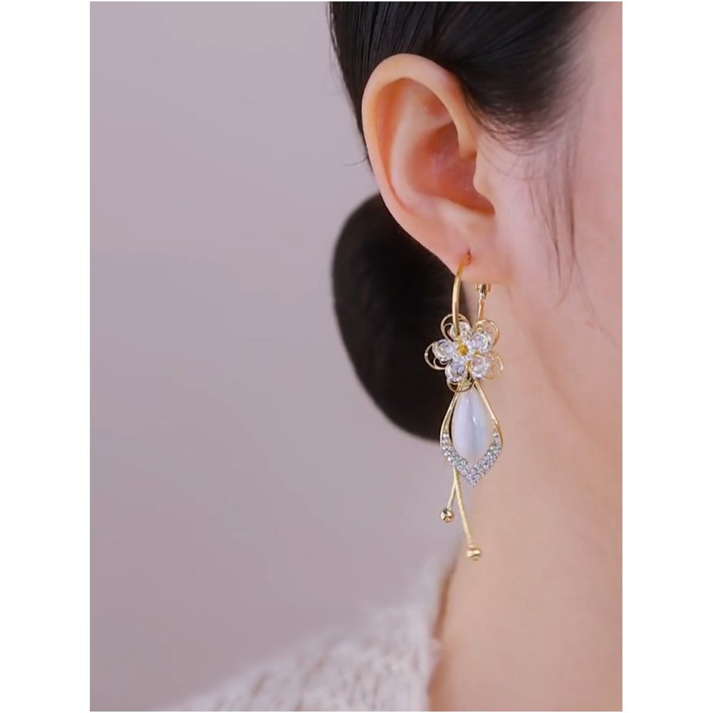 Zircon flower long tassel ball earrings for women long cat s eye stone design trendy and versatile new style image 4