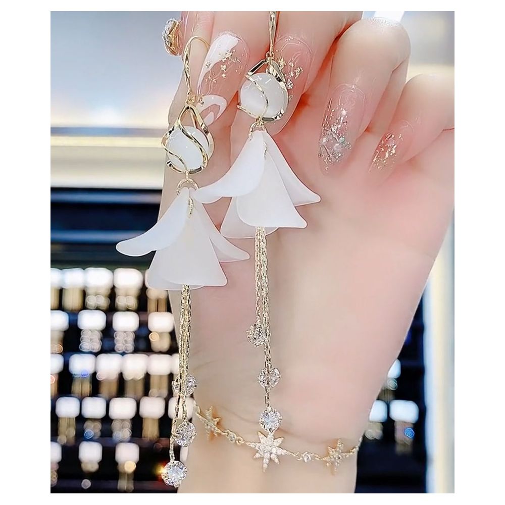 Flower white dress cat eye stone elegant earrings tassel long style 2024 new explosive anti allergic earrings image 0