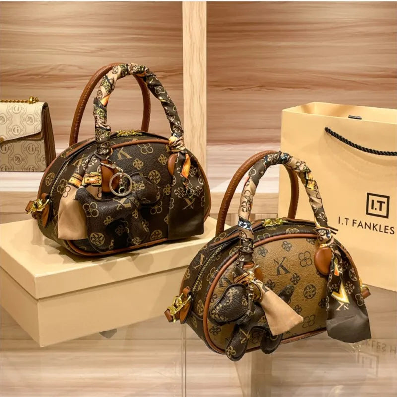 Brand women's handbag 2025 new autumn and winter high-end texture niche designer light luxury shoulder crossbody bag shell bag