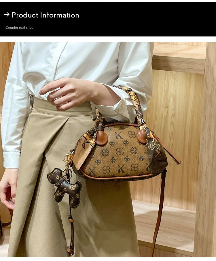 Brand women's handbag 2025 new autumn and winter high-end texture niche designer light luxury shoulder crossbody bag shell bag