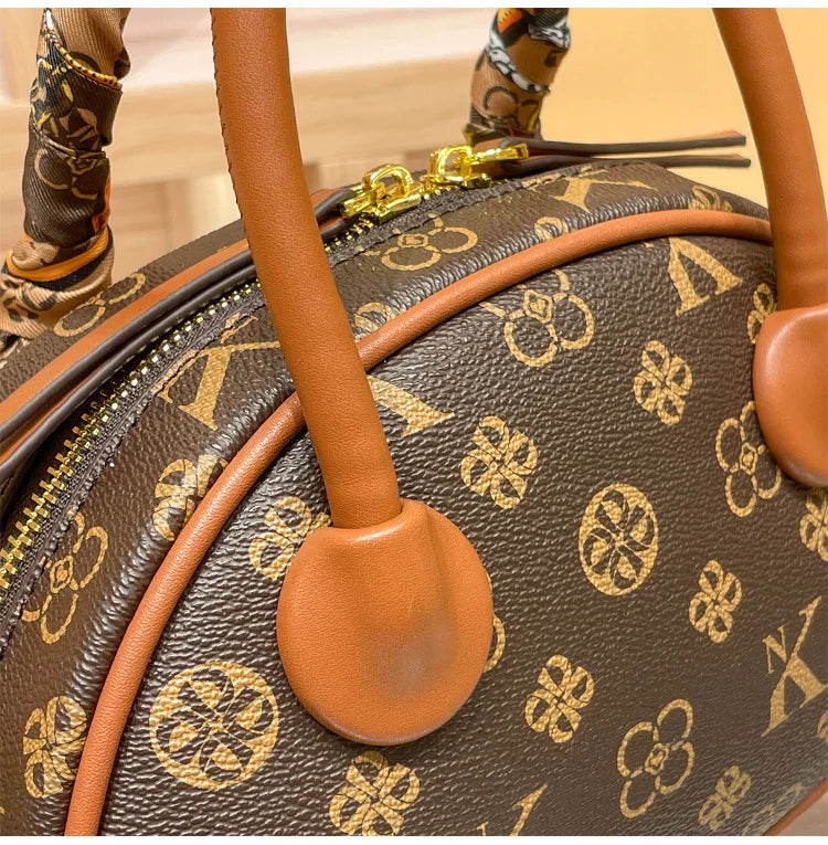 Brand women's handbag 2025 new autumn and winter high-end texture niche designer light luxury shoulder crossbody bag shell bag