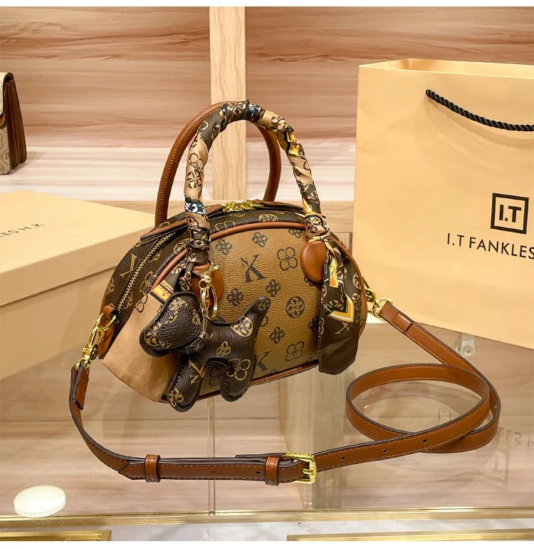 Brand women's handbag 2025 new autumn and winter high-end texture niche designer light luxury shoulder crossbody bag shell bag