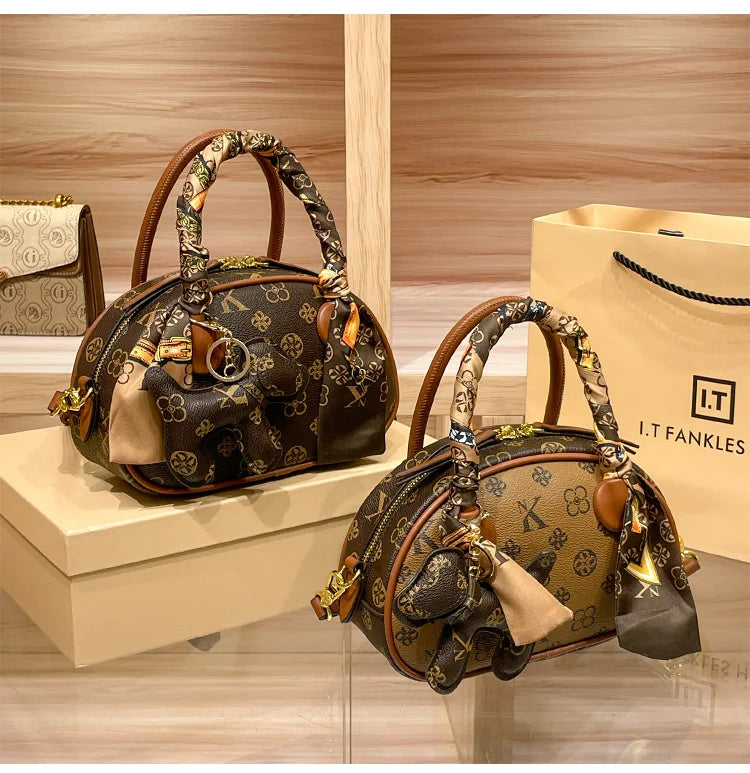 Brand women's handbag 2025 new autumn and winter high-end texture niche designer light luxury shoulder crossbody bag shell bag