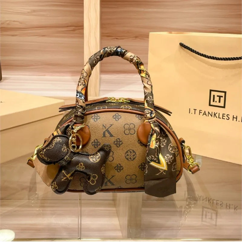Brand women's handbag 2025 new autumn and winter high-end texture niche designer light luxury shoulder crossbody bag shell bag