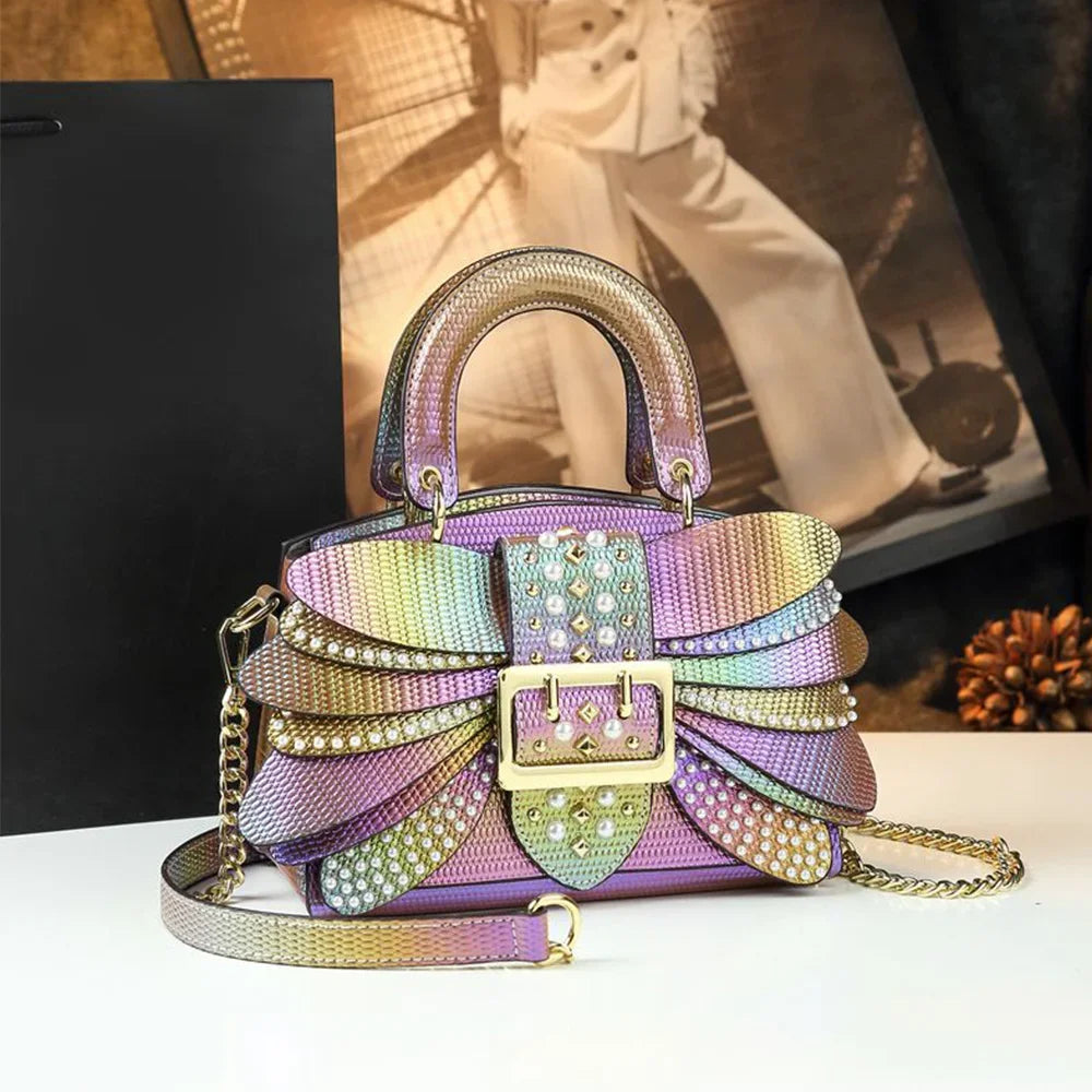 2025 new riveted wing hand-held women's bag, colorful chain crossbody single-shoulder dinner buns mother bag