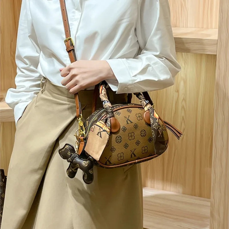 Brand women's handbag 2025 new autumn and winter high-end texture niche designer light luxury shoulder crossbody bag shell bag
