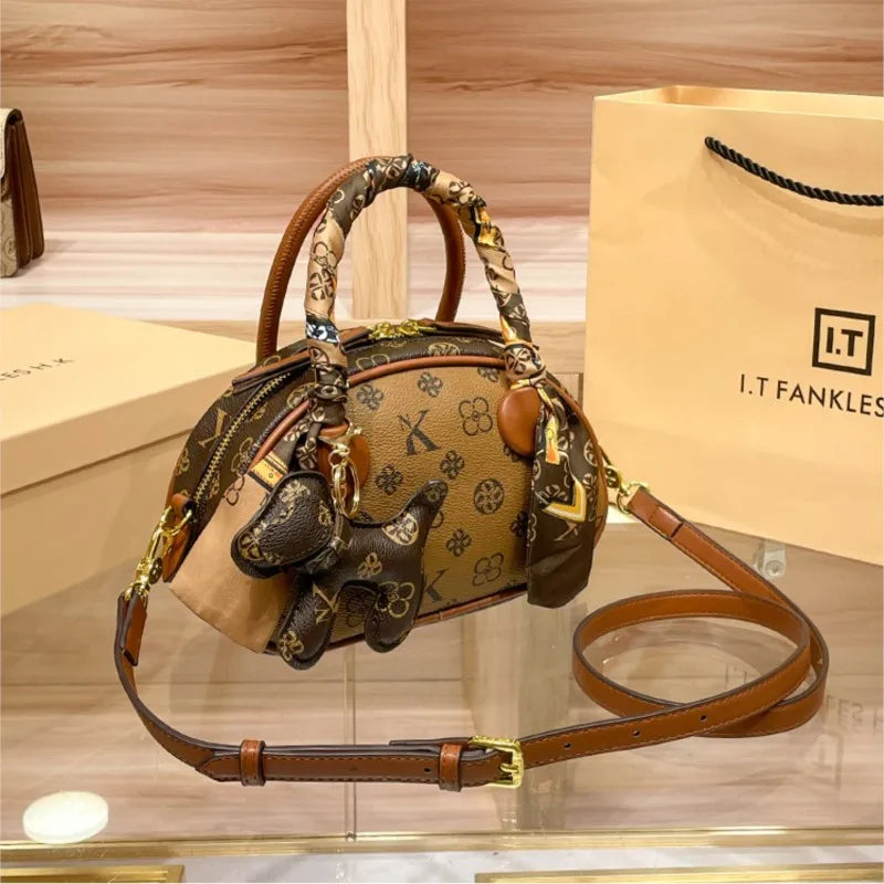 Brand women's handbag 2025 new autumn and winter high-end texture niche designer light luxury shoulder crossbody bag shell bag