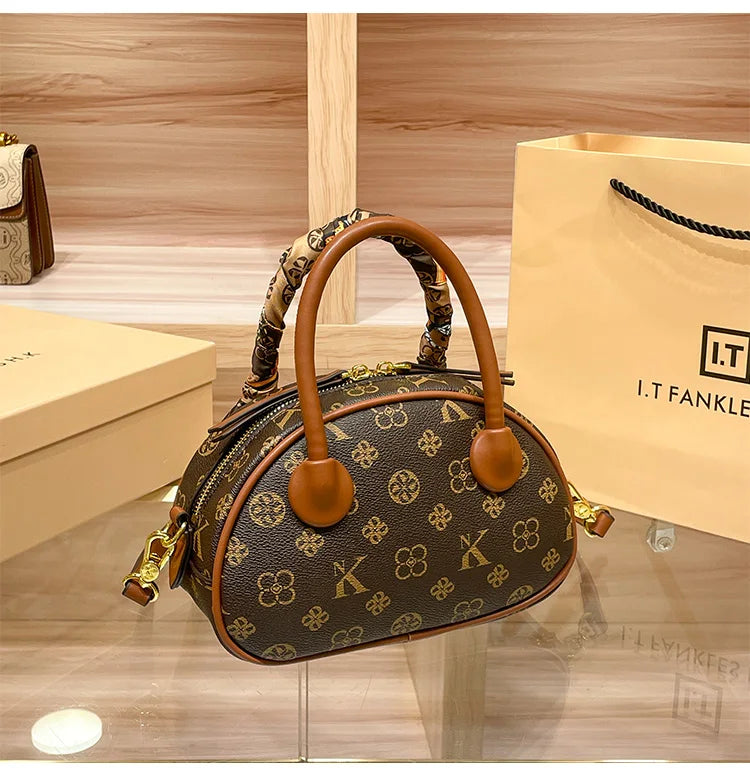 Brand women's handbag 2025 new autumn and winter high-end texture niche designer light luxury shoulder crossbody bag shell bag