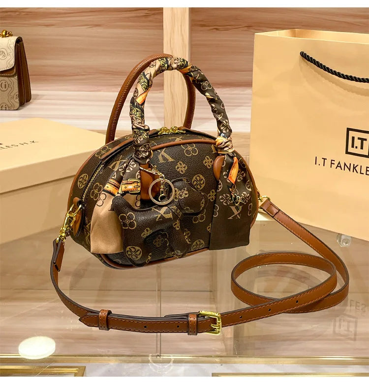 Brand women's handbag 2025 new autumn and winter high-end texture niche designer light luxury shoulder crossbody bag shell bag