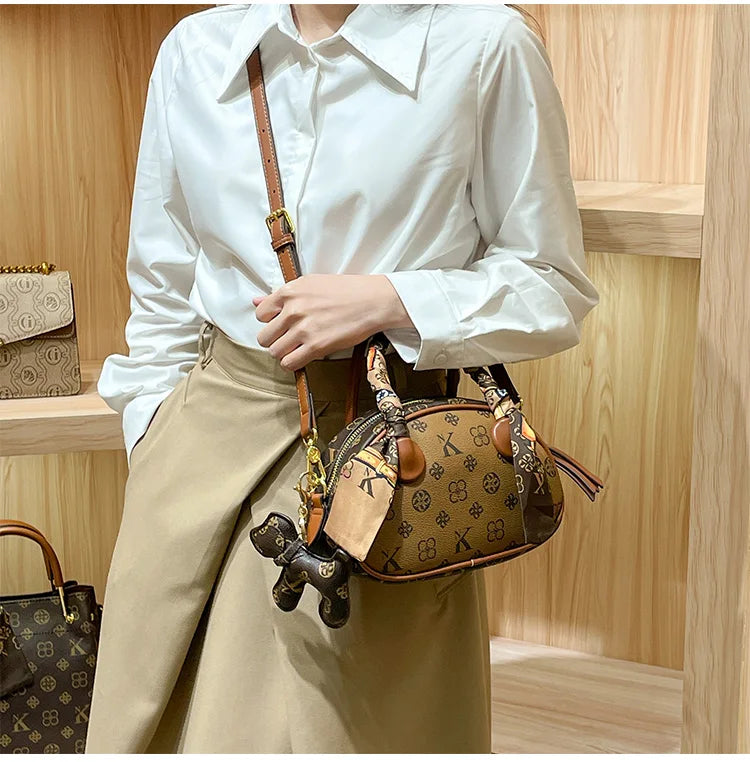 Brand women's handbag 2025 new autumn and winter high-end texture niche designer light luxury shoulder crossbody bag shell bag
