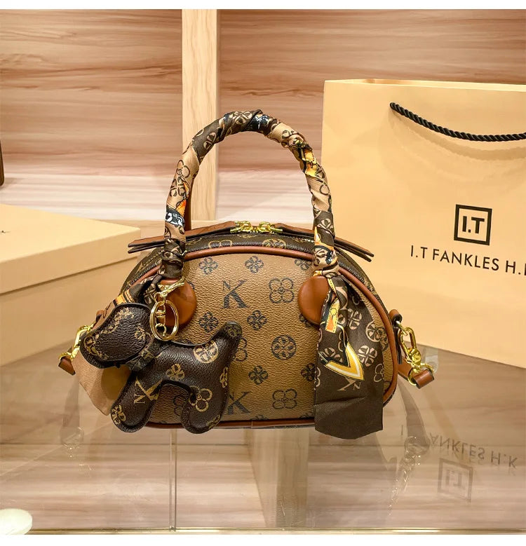 Brand women's handbag 2025 new autumn and winter high-end texture niche designer light luxury shoulder crossbody bag shell bag