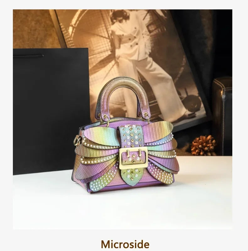 2025 new riveted wing hand-held women's bag, colorful chain crossbody single-shoulder dinner buns mother bag