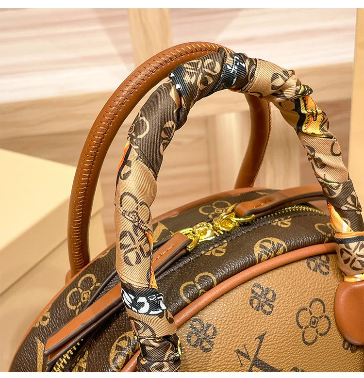 Brand women's handbag 2025 new autumn and winter high-end texture niche designer light luxury shoulder crossbody bag shell bag