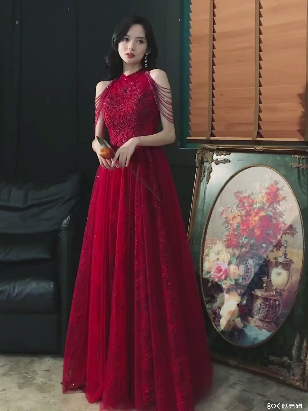 Wine red wedding dress for brides exuding elegance and sophistication featuring delicate tassels on the shoulders a touch of understated luxury