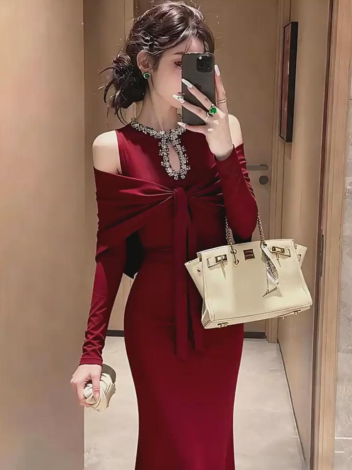 A sophisticated and elegant red off-shoulder long dress for autumn, exuding a high-end goddess vibe